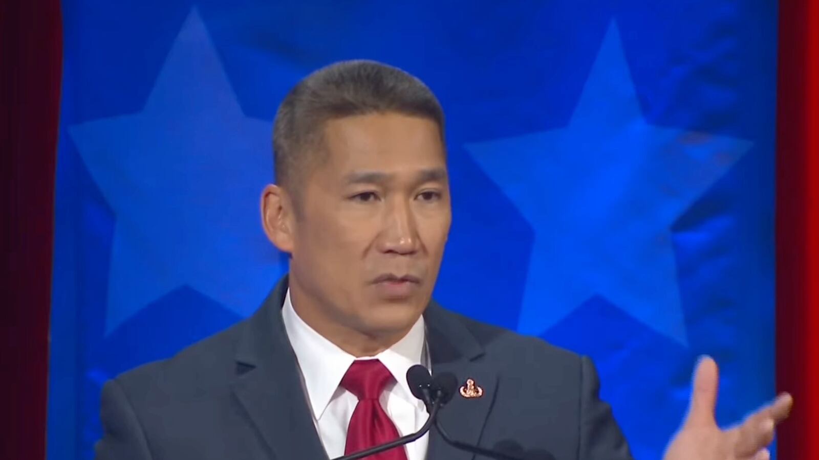 Hung Cao speaks during a televised debate Wednesday.