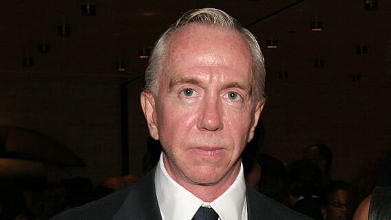 Brent Sikkema stares forward while posing for a photo at an event.