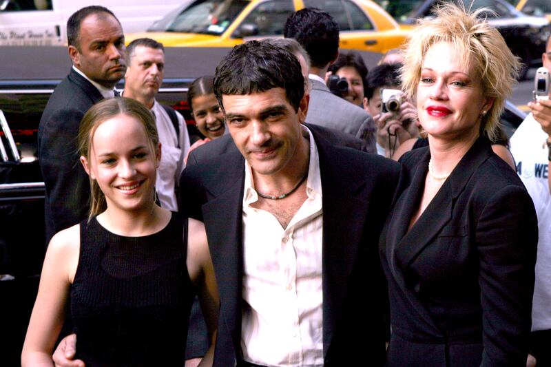 Dakota Johnson, Antonio Banderas and Melanie Griffith (Photo by James Devaney/WireImage)