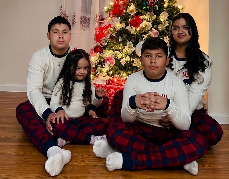 Army Sgt. Hedar Leonel Turcios Juárez and Cristy Maryori Villafranca-Trejo with their children.