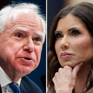 Minnesota Gov. Tim Walz and outgoing DHS Secretary Kristi Noem