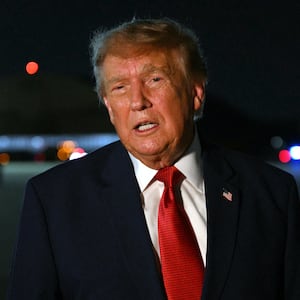 President Donald Trump speaks with reporters after landing at Joint Base Andrews, Maryland, upon his return from Ohio where he attended the Patriot Games finals, on August 11, 2026.