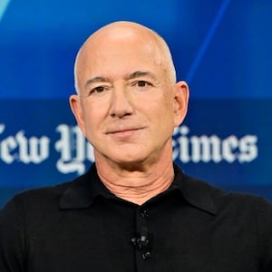 NEW YORK, NEW YORK - DECEMBER 04: Jeff Bezos speaks onstage during The New York Times Dealbook Summit 2024 at Jazz at Lincoln Center on December 04, 2024 in New York City.  (Photo by Eugene Gologursky/Getty Images for The New York Times)