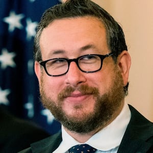 US Citizenship and Immigration Services (USCIS) Deputy Director for Policy Joseph Edlow,(R) and Secretary of State Mike Pompeo, applaud and congratulate new US citizens during a naturalization ceremony hosted by the USCIS at the State Department in Washington, DC, on October 22, 2020. (Photo by Manuel Balce Ceneta / POOL / AFP) (Photo by MANUEL BALCE CENETA/POOL/AFP via Getty Images)