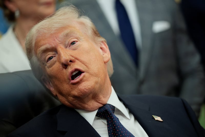 U.S. President Donald Trump speaks during an event to sign a memorandum in the Oval Office at the White House in Washington, D.C., U.S., May 5, 2026. REUTERS/Evan Vucci