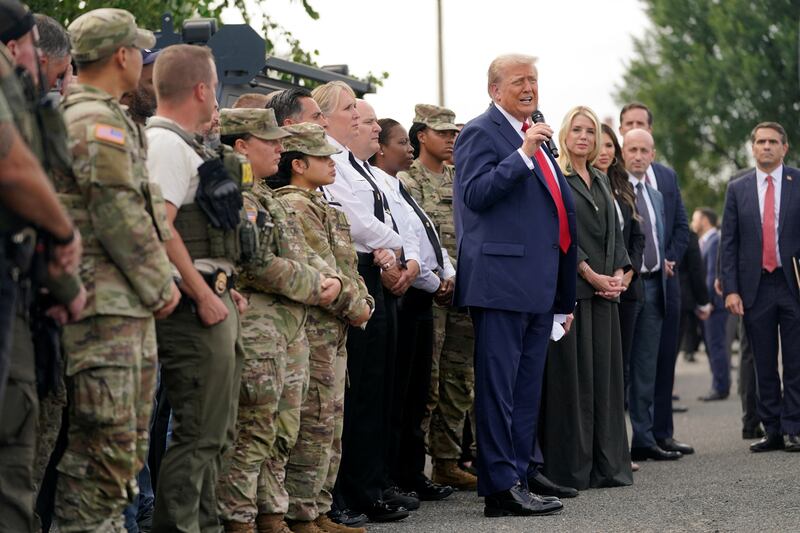 U.S. President Donald Trump speaks as he attends U.S. Park Police Anacostia Operations Facility to meet with police and the military, after deploying National Guard troops in the nation's capital, in Washington, D.C., U.S., August 21, 2025.  REUTERS/Nathan Howard