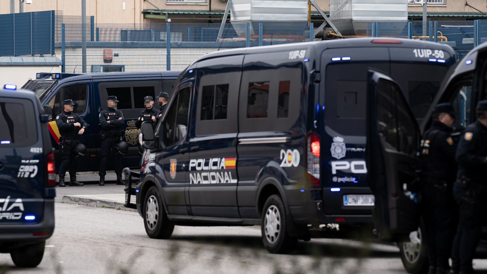 Vehicles and National Police officers in Madrid, Spain.