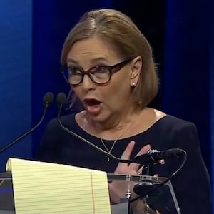 Darline Graham gets booed during a TV debate.