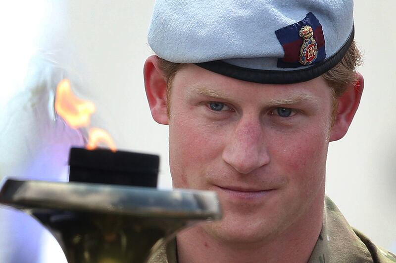 articles/2013/05/09/prince-harry-s-us-tour-rolling-updates-and-all-the-news-and-pictures-as-it-happens/harry-torch_xtfjzw