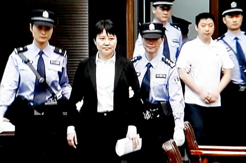articles/2012/08/20/gu-kailai-gets-suspended-death-sentence/gu-kailai-verdict-liu_t4ltdy