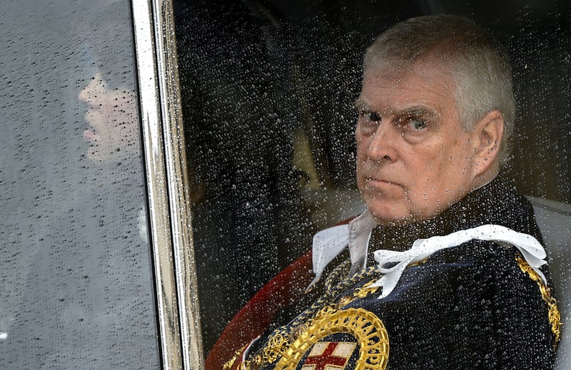 Britain's Prince Andrew, Duke of York leaves Westminster Abbey following the coronation ceremony of King Charles III and Queen Camilla on May 6, 2023 in London, England.