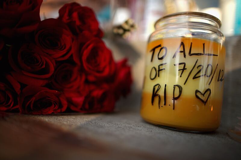 articles/2012/07/22/colorado-massacre-no-causes-no-cures/aurora-memorial_qudvns