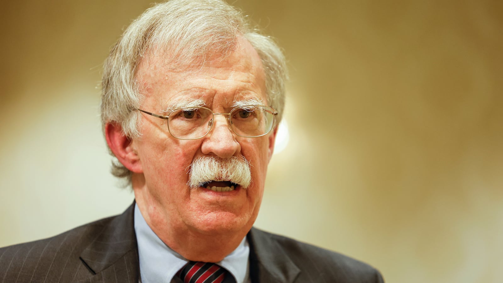 WASHINGTON, DC - AUGUST 17: Former National Security Adviser John Bolton speaks to reporters after speaking in a panel hosted by the National Council of Resistance of Iran – U.S. Representative Office (NCRI-US) at the Willard InterContinental Hotel on August 17, 2022 in Washington, DC. The NCRI-US held the panel to mark the 20th anniversary of their first press conference on the perceived threat of Iran’s nuclear weapons program. Recently the U.S. Justice Department announced charges against an Iranian operative for a plot to murder John Bolton. (Photo by Anna Moneymaker/Getty Images)