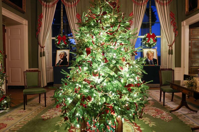 Lego portraits of Trump and former President George Washington are seen alongside holiday decorations in the Green Room.