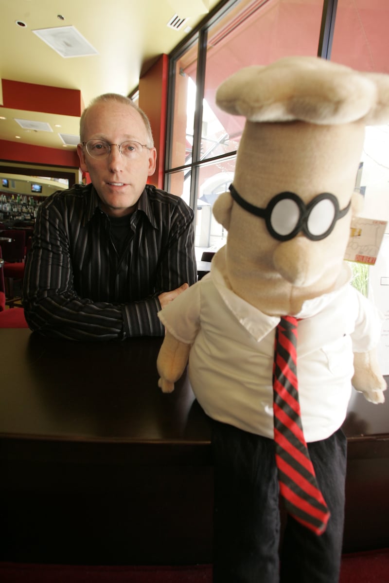 Scott Adams with his character, Dilbert.