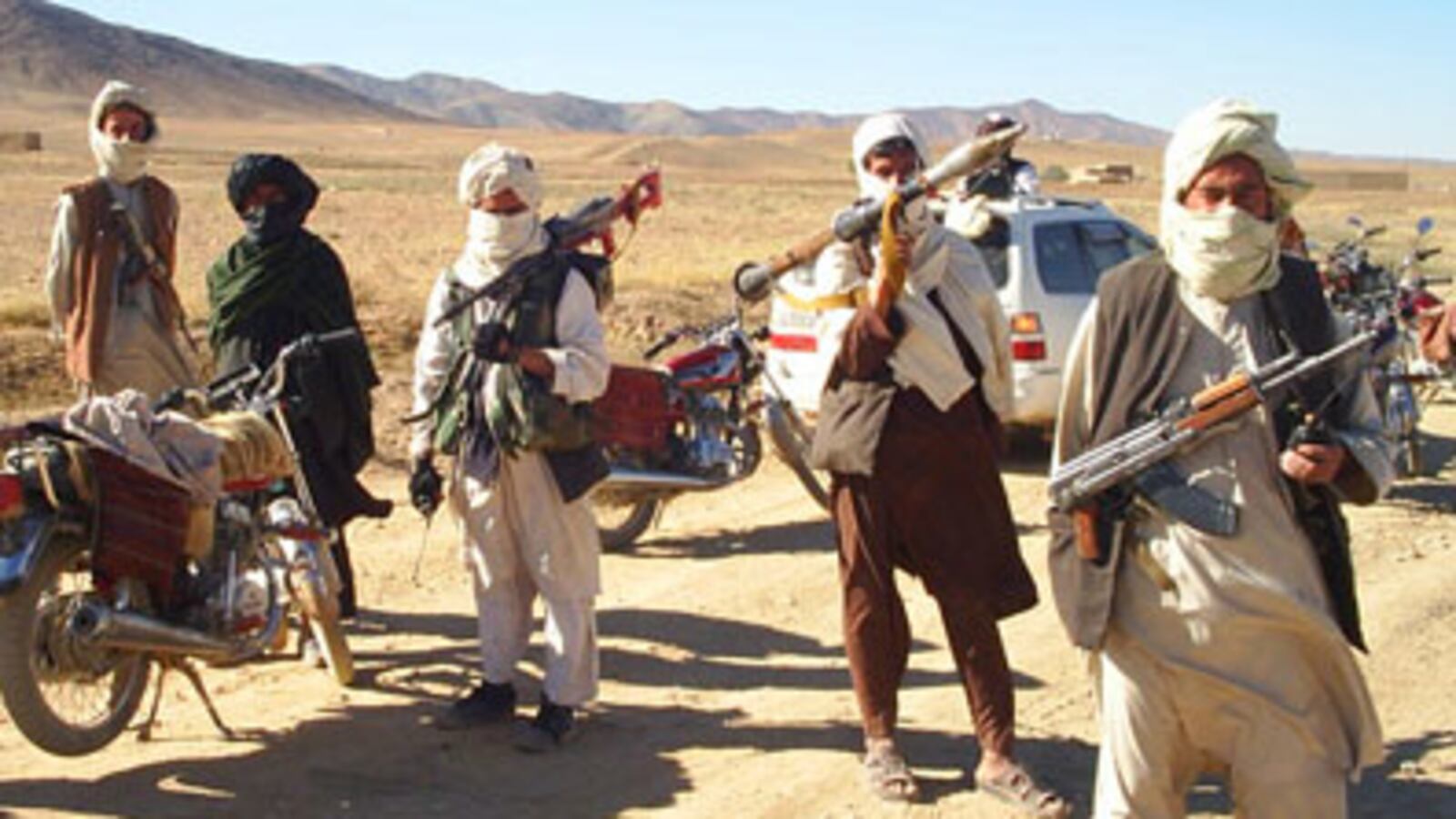 cheats/2009/12/31/taliban-takes-credit-for-afghan-blast/taliban-fighters_xmgaoz