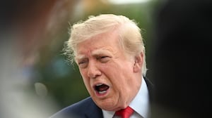 US President Donald Trump speaks to members of the press before boarding Marine One as he departs from the South Lawn of the White House in Washington, DC, on September 26, 2026. US President Donald Trump is heading to Knoxville, Tennessee to attend the Tennessee/Texas college football game.