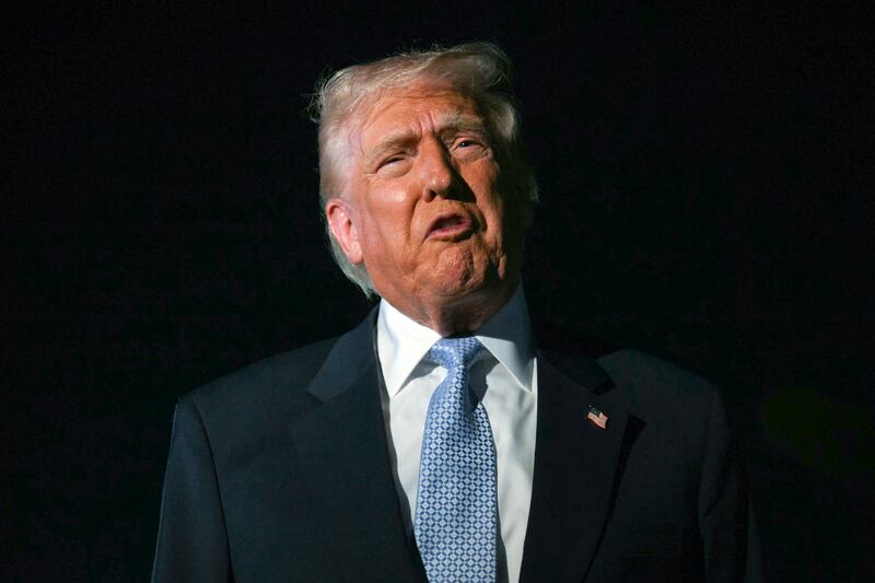 US President Donald Trump speaks with reporters before boarding Air Force One as he departs Palm Beach International Airport in West Palm Beach, Florida, on November 16, 2025. Trump is returning to the White House after spending the weekend at his Mar-a-Lago, Florida, residence. (Photo by Jim WATSON / AFP) (Photo by JIM WATSON/AFP via Getty Images)