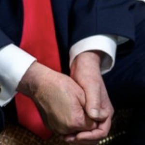 Close-up of Trump's make-up covered hand at the White House.
