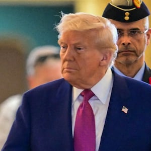 UAE President Sheikh Mohamed bin Zayed Al Nahyan (R) welcomes his US counterpart Donald Trump upon arrival at the presidential terminal in Abu Dhabi on May 15, 2025.