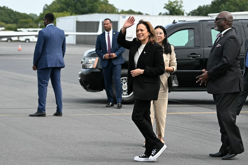 US Vice President and Democratic presidential candidate Kamala Harris waves as she arrives at Charlotte Douglas International Airport in Charlotte, North Carolina, on September 12, 2024. Harris is in North Carolina to speak at campaign events. (Photo by Jim WATSON / AFP) (Photo by JIM WATSON/AFP via Getty Images)