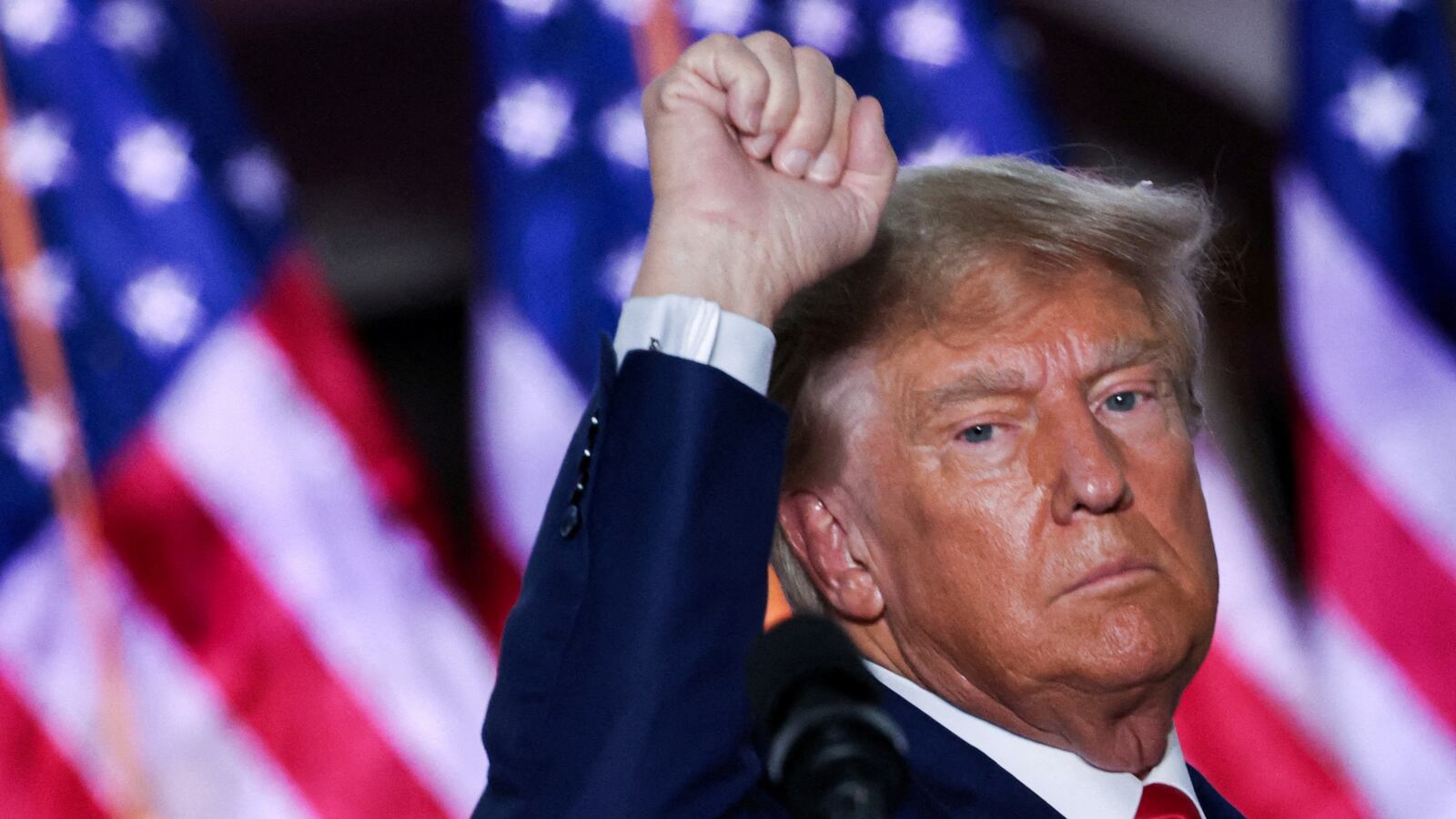 Former U.S. President Donald Trump gestures during an event following his arraignment on classified document charges.