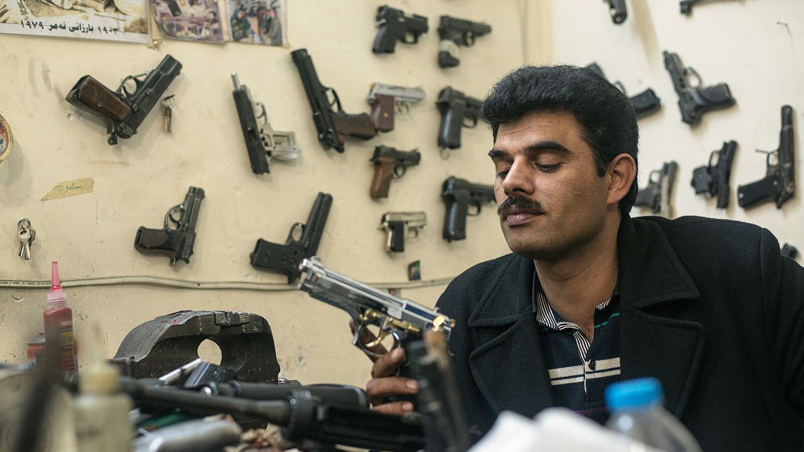 articles/2015/02/18/the-mad-max-gunmaker-fighting-isis/150217-wolf-gunsmith2_qvevmp