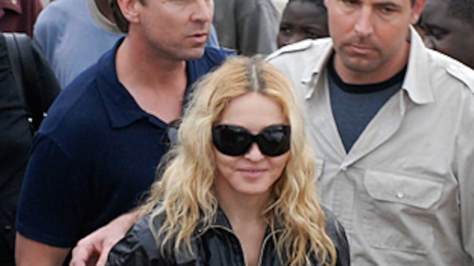 cheats/2009/04/13/madonna-begs-for-mercy/madonna-1_rv1t6p