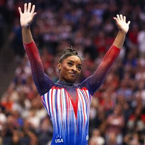 Simone Biles celebrates her floor routine during the U.S. Olympic Team Gymnastics Trials at Target Center.