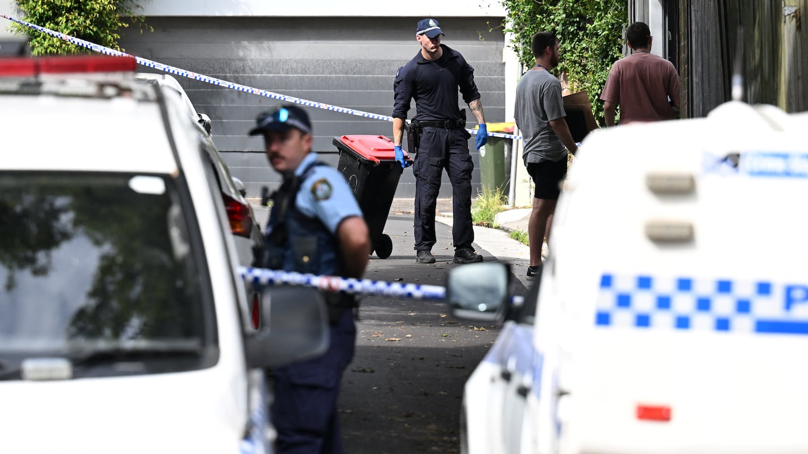 Police officers work at a crime scene at Waite Road in Paddington, Sydney, Australia February 23, 2024.