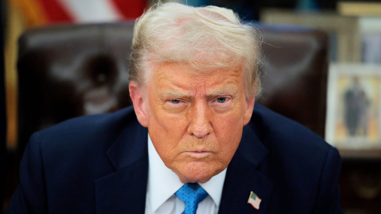 Donald Trump talks to reporters after signing an executive order, "Unleashing prosperity through deregulation," in the Oval Office on January 31, 2025 in Washington, DC.