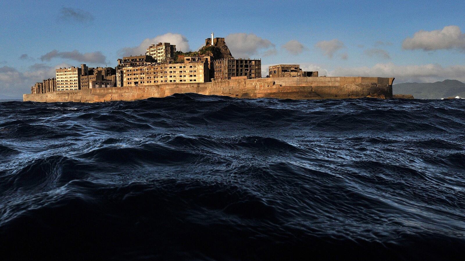 articles/2014/08/07/japan-s-james-bond-villain-ghost-town/140806-Strochlic-japan-island-tease._vw48zu