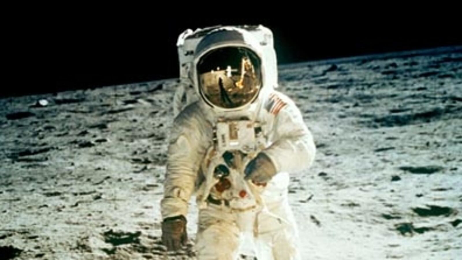 cheats/2011/05/21/woman-shills-moon-rock-for-17m/wrap-space-man-on-the-moon_rhclg7