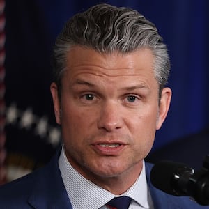 PALM BEACH, FLORIDA - JANUARY 03: U.S. Secretary of War Pete Hegseth speaks during a press conference with U.S. President Donald Trump at Mar-a-Lago club on January 03, 2026, in Palm Beach, Florida. During the event, President Trump confirmed that the U.S. military carried out a large-scale strike in Caracas overnight, resulting in the capture of Venezuelan leader Nicolas Maduro and his wife, Cilia Flores. (Photo by Joe Raedle/Getty Images)