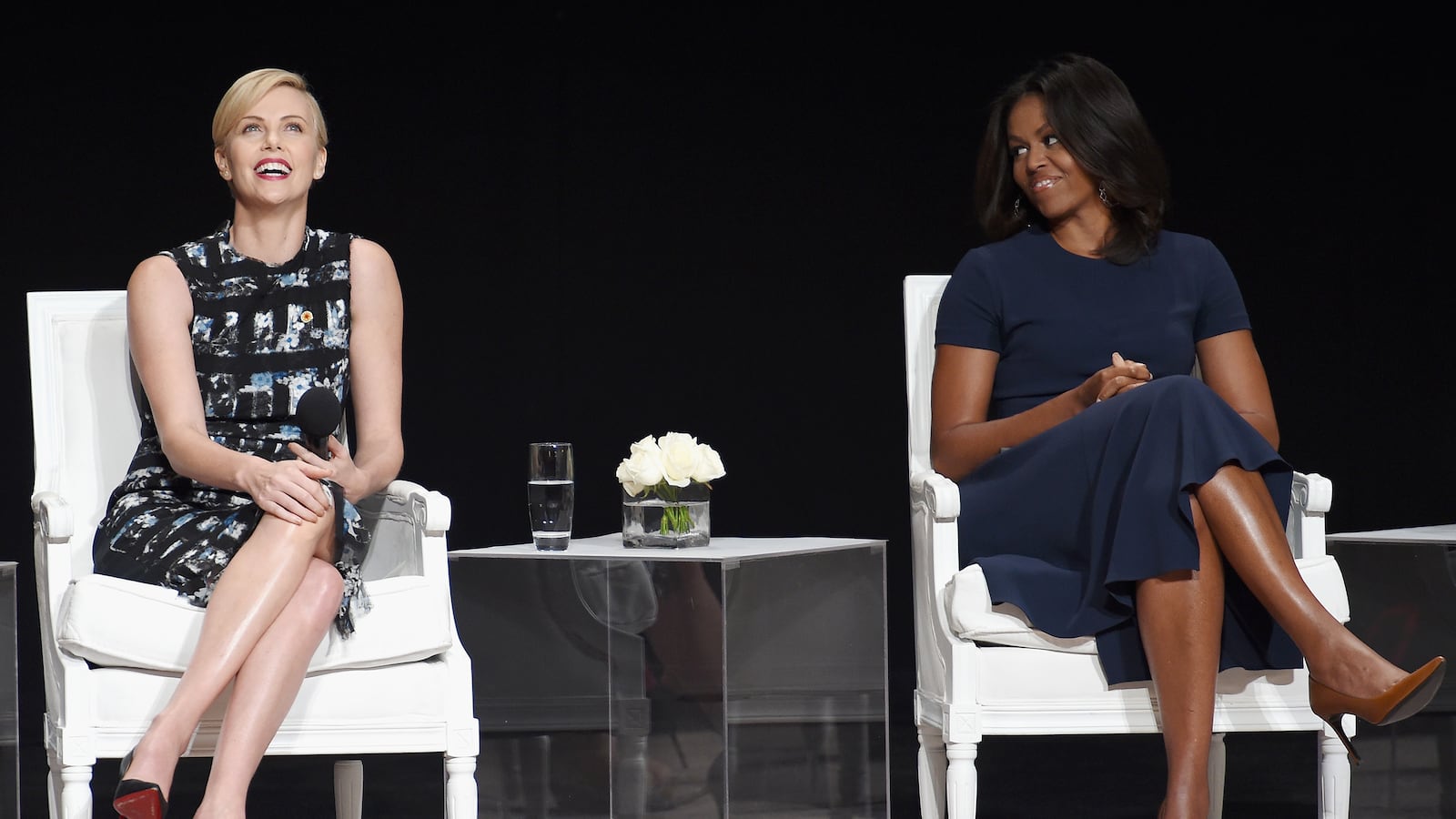 articles/2015/09/29/michelle-obama-tells-schoolgirls-to-beat-the-boys/150929-zimmerman-obama-theron-tease_ekh2of