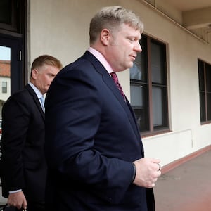 Attorney Timothy Parlatore leaves a courthouse.