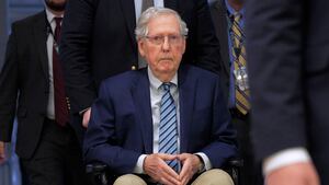 WASHINGTON, DC - FEBRUARY 18:  U.S. Sen. Mitch McConnell (R-KY) is pushed in a wheelchair as he heads for votes at the Capitol on February 18, 2025 in Washington, DC. President Donald Trump said Tuesday that Ukraine "should have never started it" in comments about Russia's invasion of the country in February 2022. (Photo by Chip Somodevilla/Getty Images)