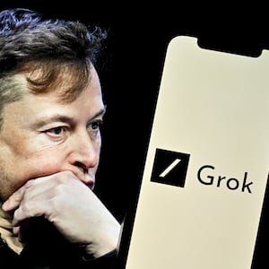 In this photo illustration, Elon Musk's photo is displayed in front of Grok logo on a phone screen, in Ankara, Turkiye on November 7, 2023.