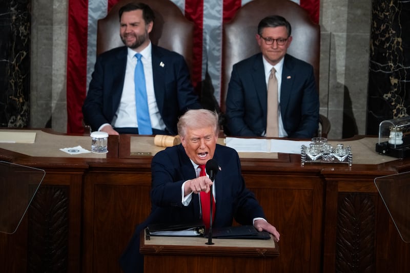 President Donald Trump delivers his State of the Union address in the House Chamber of the U.S. Capitol on Tuesday, February 24, 2026. Vice President JD Vance, left, and Speaker of the House Mike Johnson, R-La., also appear.