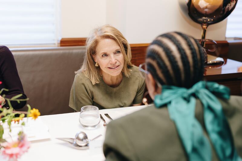 Katie Couric speaks with tablemates at the Power 100 luncheon on November 4, 2025.