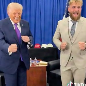 Donald Trump dances with boxer Jake Paul.