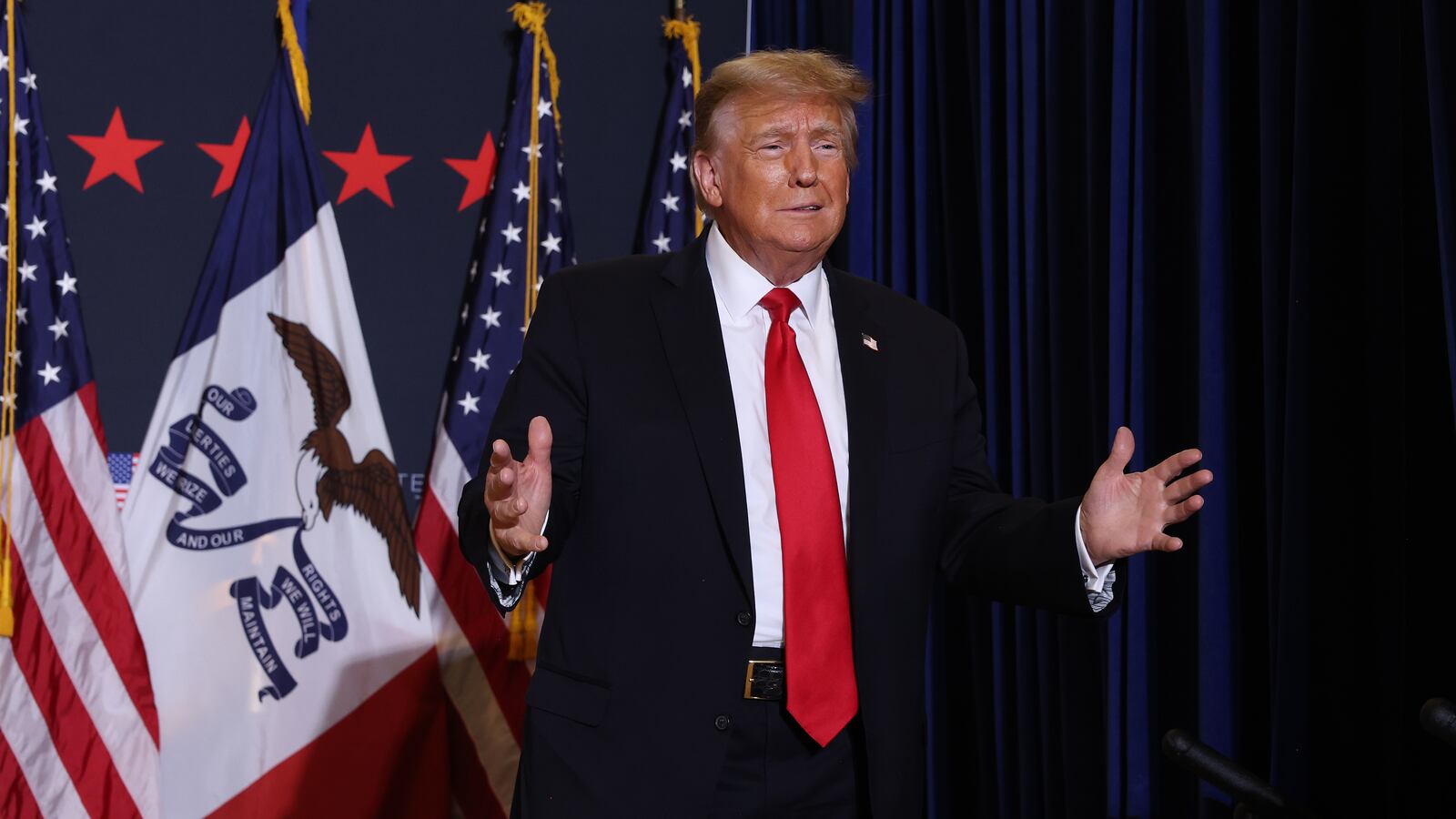 Republican presidential candidate, former President Donald Trump arrives at a campaign event at the Hyatt Hotel on December 13, 2023 in Coralville, Iowa.