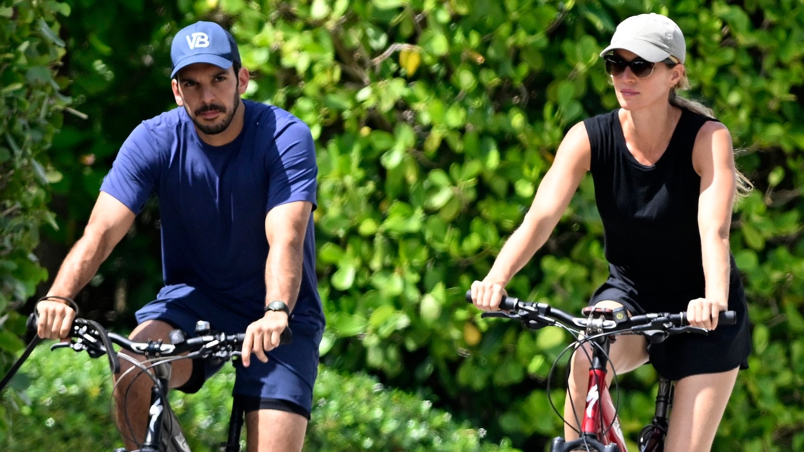 SURFSIDE, FL - JULY 14: Joaquim Valente and Gisele Bündchen are seen on a bike ride on July 14, 2024 in Surfside, Florida. (Photo by MEGA/GC Images)