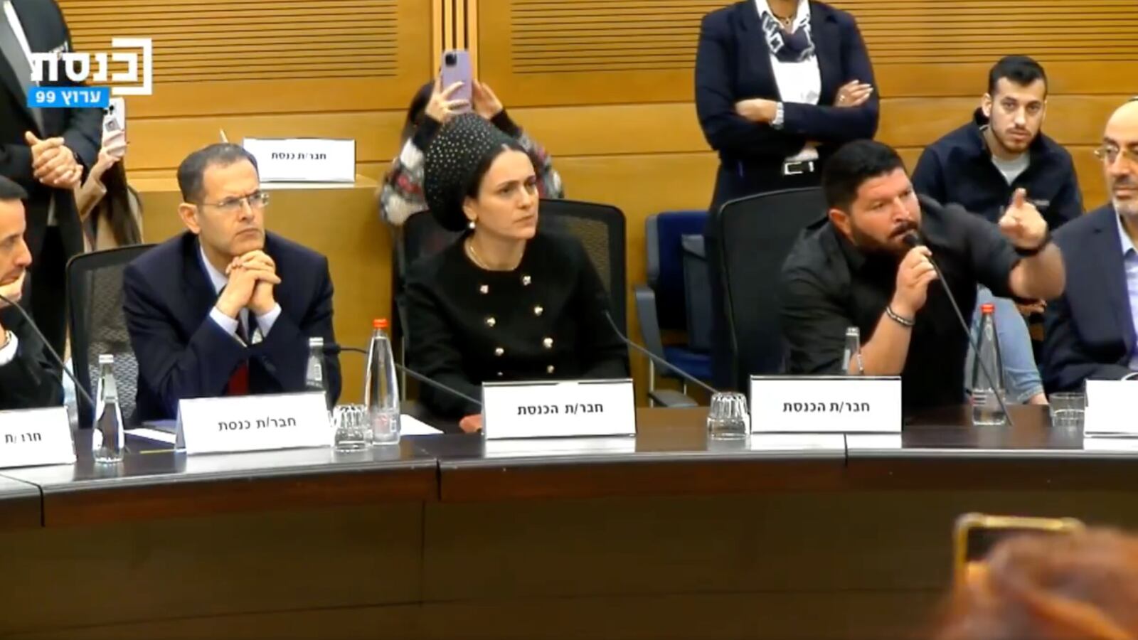 Extremist lawmakers shout at the families of Israeli hostages.