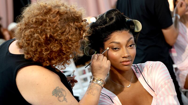 NEW YORK, NEW YORK - OCTOBER 15: Angel Reese prepares backstage at the Victoria's Secret Fashion Show 2025 on October 15, 2025 in New York City.