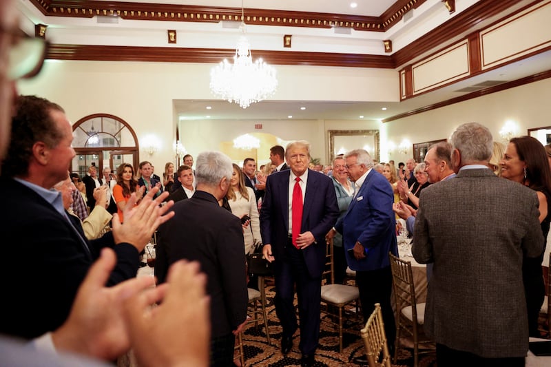Republican presidential candidate and former U.S. President Donald Trump attends the 2024 Senior Club Championship award ceremony at his Trump International Golf Club in West Palm Beach, Florida, U.S. March 24, 2024.  REUTERS/Marco Bello
