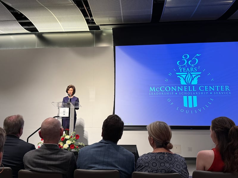 Elaine Chao speaking at the event, without McConnell.