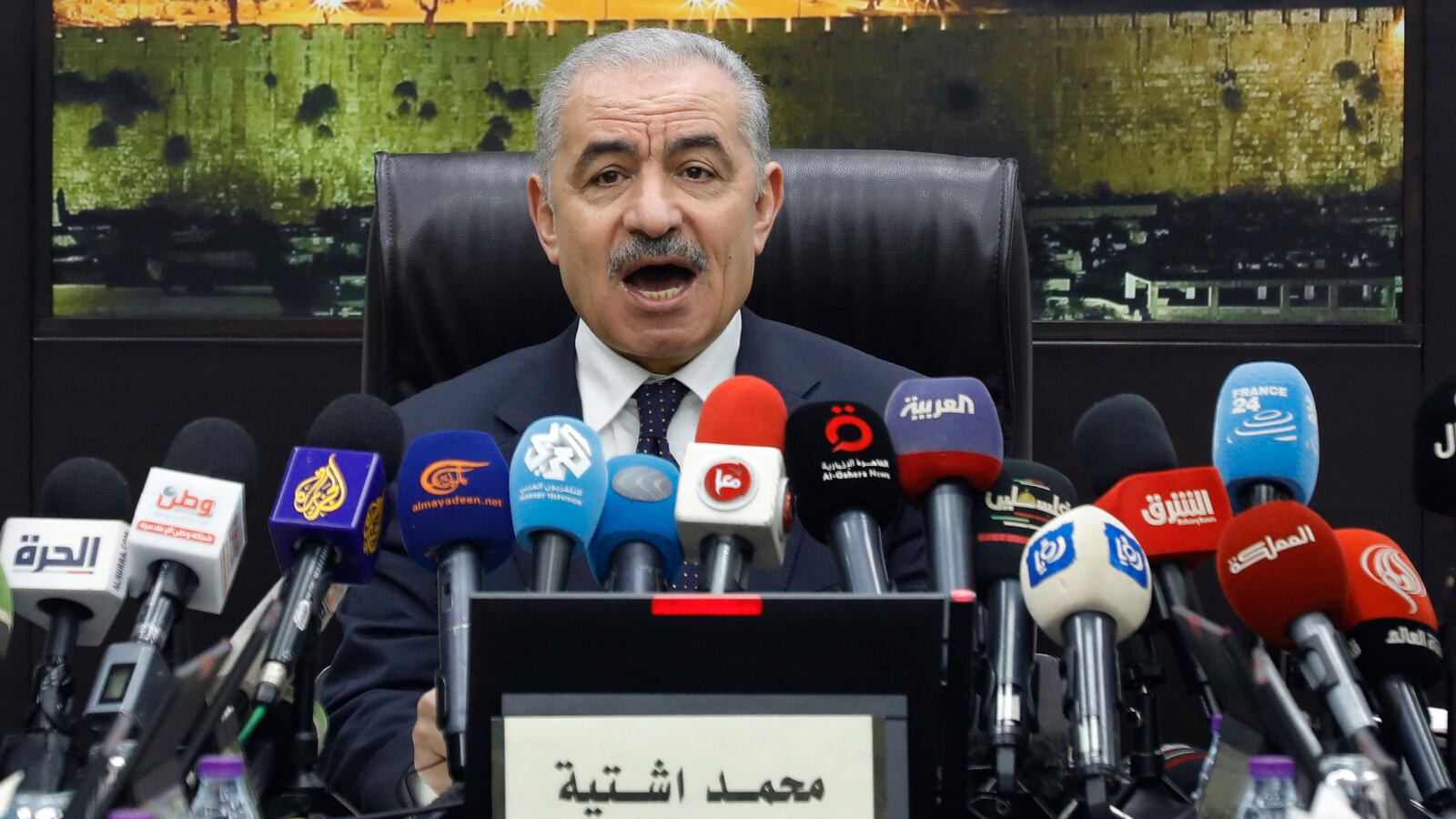 Palestinian Prime Minister Mohammad Shtayyeh announces his government's resignation in Ramallah.