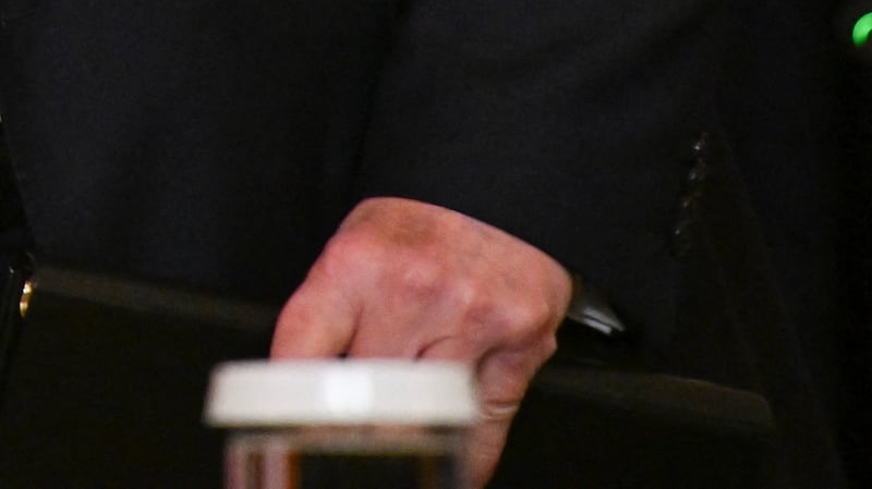 Donald Trump Mike Johnson hands bruise