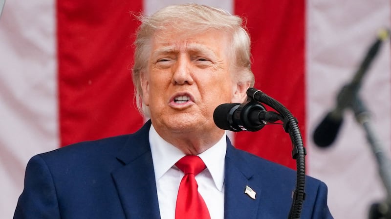 U.S. President Donald Trump delivers remarks in the Memorial Amphitheater during a Memorial Day event at Arlington National Cemetery, Arlington, Virginia, U.S., May 25, 2026. REUTERS/Nathan Howard